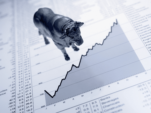 Bull market: a bull standing on a rising price chart