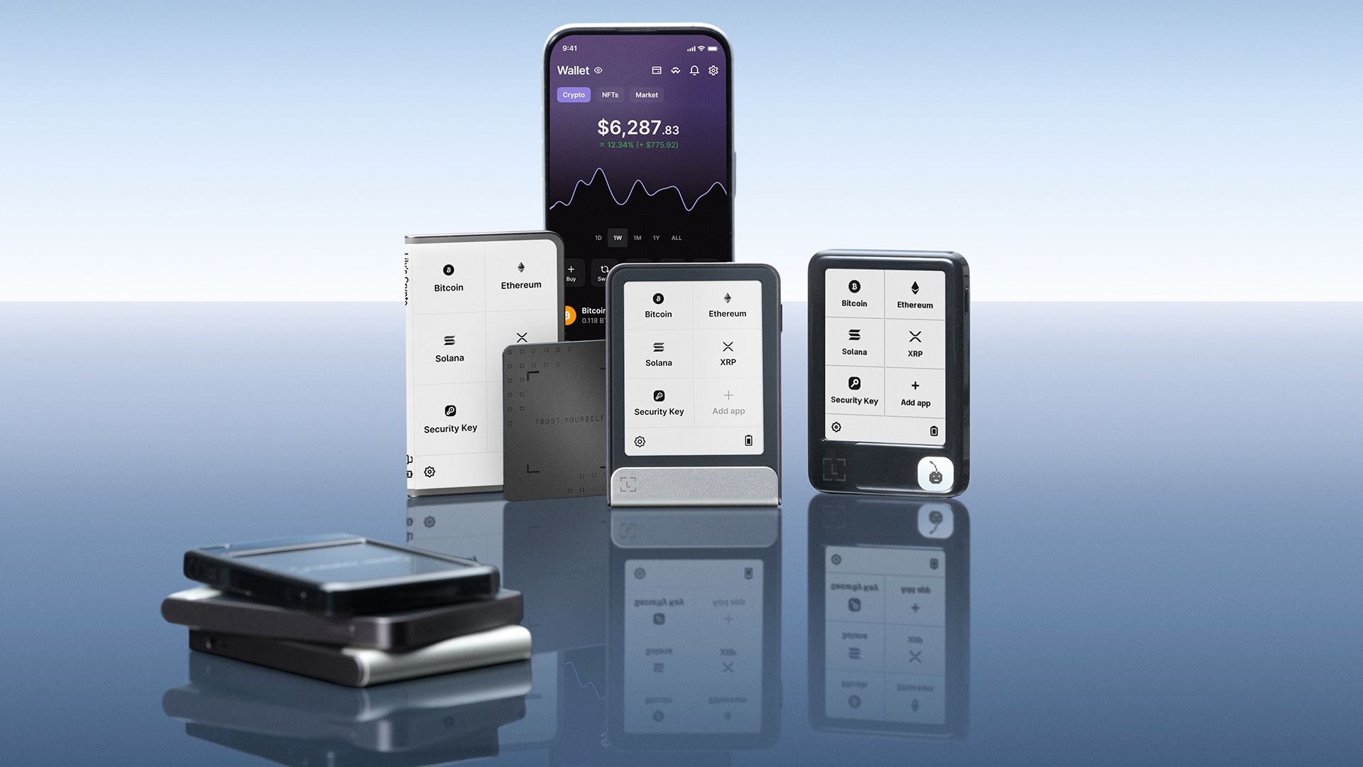 Ledger hardware wallet devices showing Bitcoin, Ethereum, Solana, XRP, security key options, and companion mobile app interface